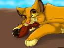 Simba chews on tail